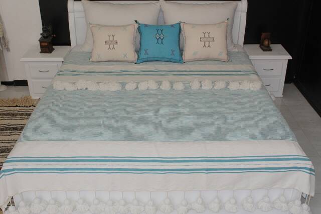 Moroccan Pompom Blanket Throw With Braided Tassels Hand Woven On A Wooden Loom, White, Turquoise Stripes For Bohemian & Eclectic Interiors - image 1