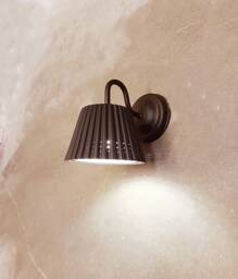 Handmade Black Ceramic Wall Sconce Perforated Texture Bedside Lamp - thumbnail 1