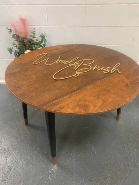 Drop Leaf Round Dining Table in Ash With Copper Dipped Legs - image 1