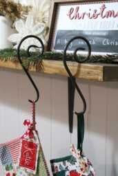 Handmade Metal Scroll Christmas Shelf Stocking Hanger - thumbnail 1