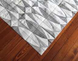 Gray & White Cowhide Patchwork Rug - Handmade Leather Floor Decor - thumbnail 1