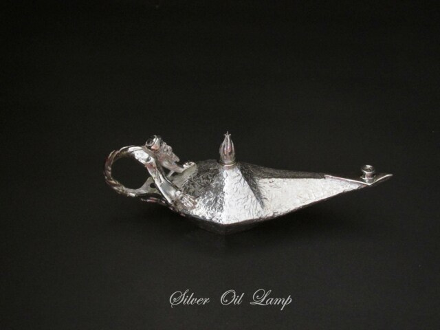 Silver Oil Lamp With A Gini Handle - image 1