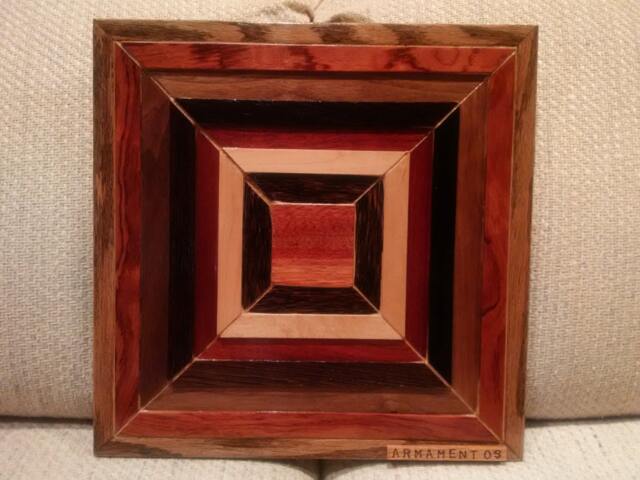 Wood Wall Art Sculpture Featuring A Variety Of Exotic Wood Pieces in Geometric Array - image 1