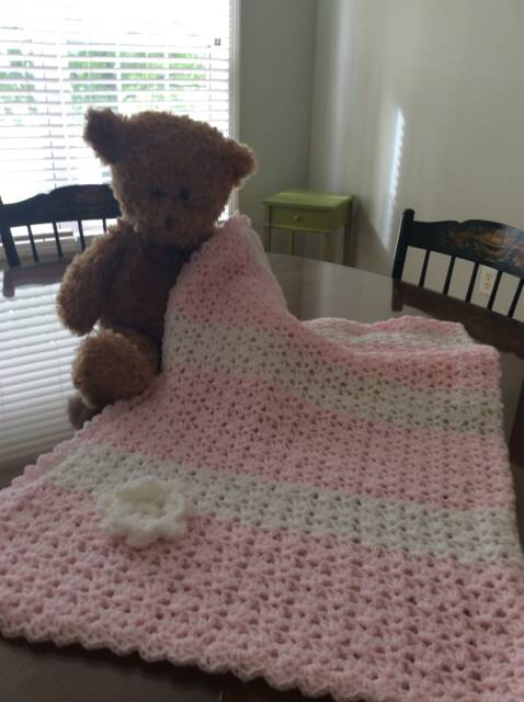 Elegant Crocheted Baby Blanket With Flower Applique