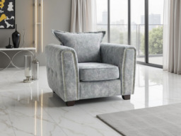Serena Elegant Fabric Armchair with Metal Trim and Quilted Sides - thumbnail 1