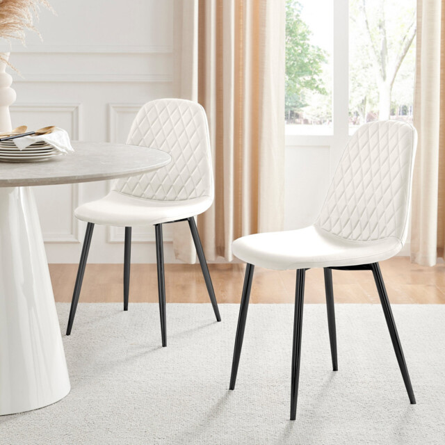 2x Corona White Faux Leather Dining Chairs Black Legs - image 1