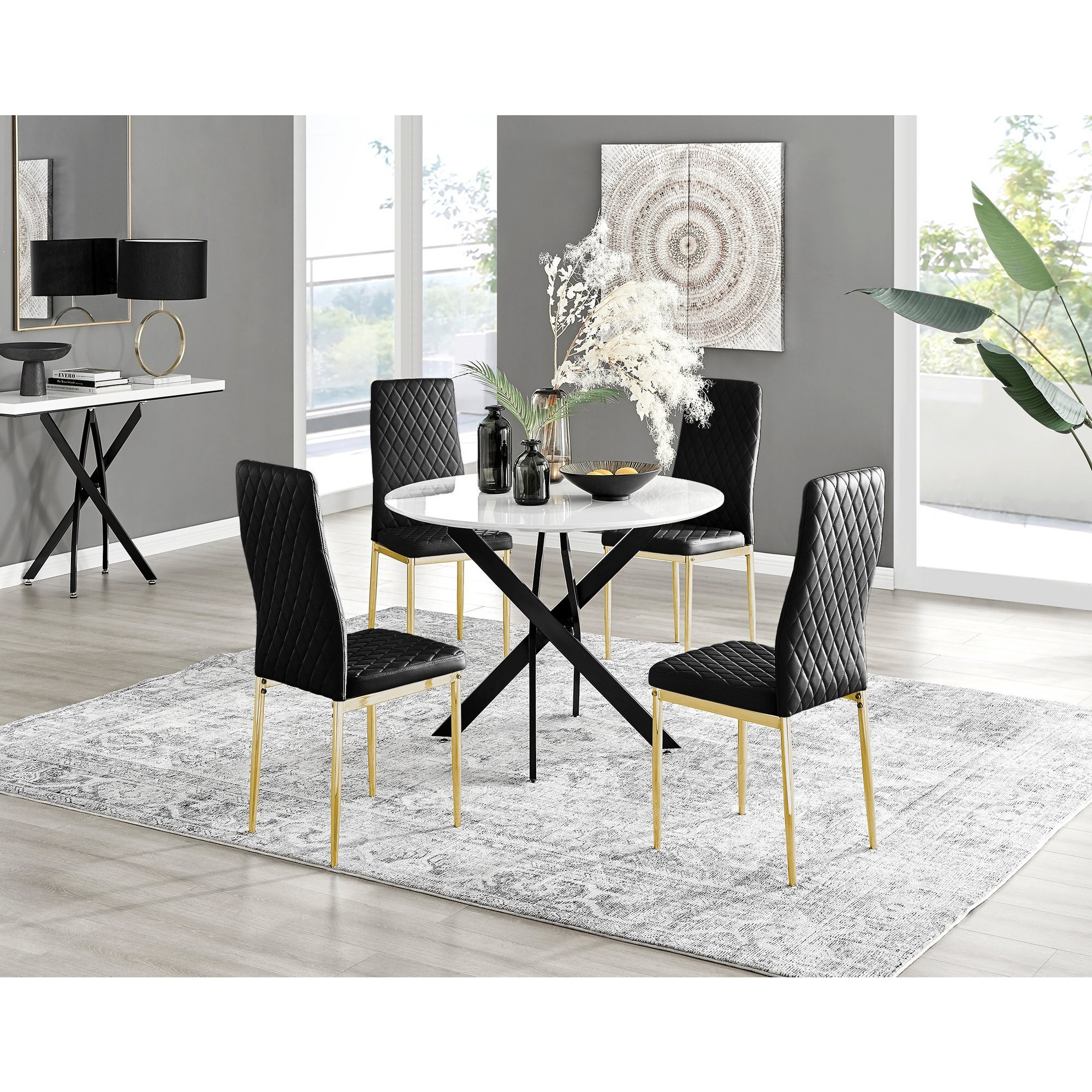 Novara White Gloss Black Leg Round Dining Table & 4 Velvet Milan Gold Leg Chairs