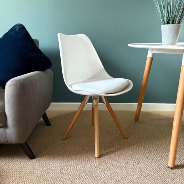 "Fusion Living Soho White Plastic Dining Chair with Pyramid Light Wood Legs "