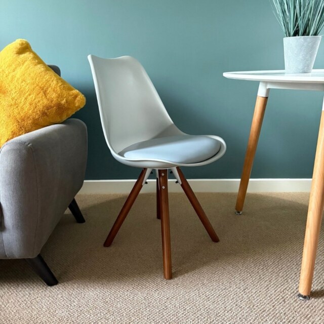 "Fusion Living Soho Light Grey Plastic Dining Chair with Pyramid Dark Wood Legs "