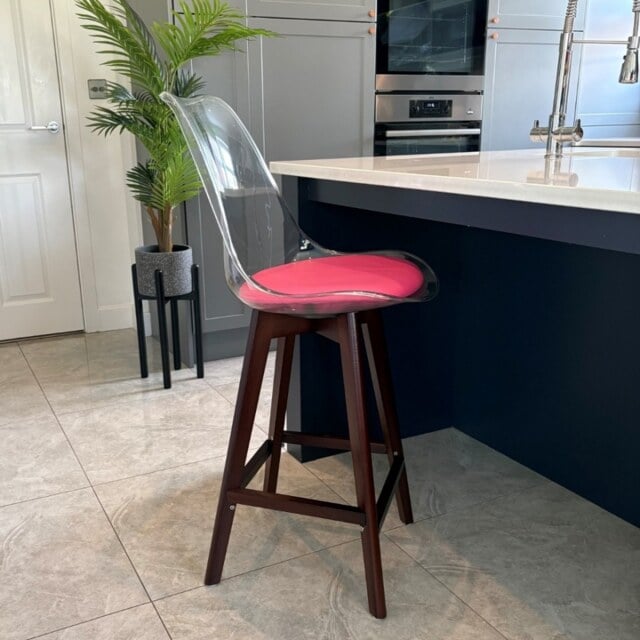 "Fusion Living Soho Clear and Bright Pink Plastic Bar Stool with Dark Wood Legs "