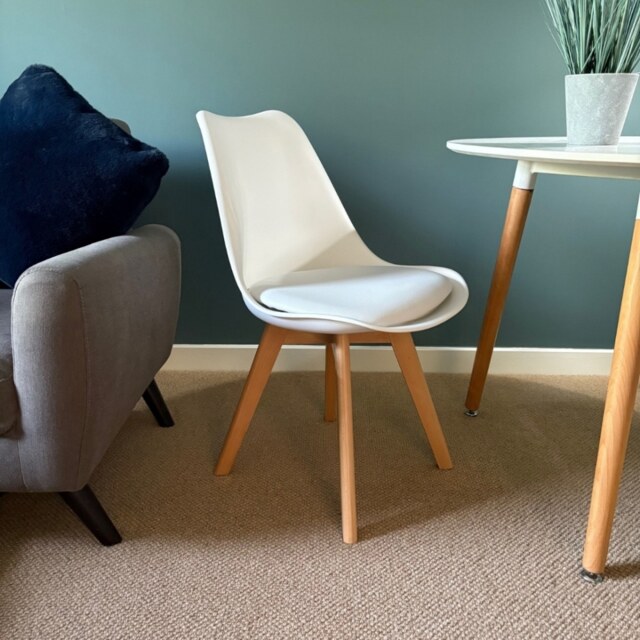 "Fusion Living Soho White Plastic Dining Chair with Squared Light Wood Legs - interlock "