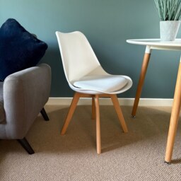 "Fusion Living Soho White Plastic Dining Chair with Squared Light Wood Legs - interlock "