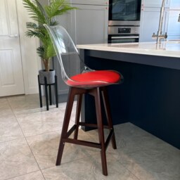 "Fusion Living Soho Clear and Red Plastic Bar Stool with Dark Wood Legs "