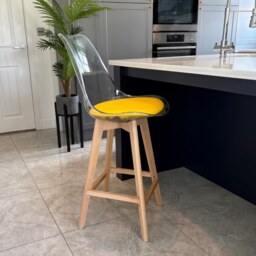"Fusion Living Soho Clear and Yellow Plastic Bar Stool with Light Wood Legs "