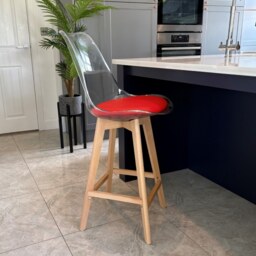 "Fusion Living Soho Clear and Red Plastic Bar Stool with Light Wood Legs "
