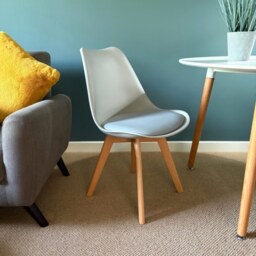 "Fusion Living Soho Light Grey Plastic Dining Chair with Squared Light Wood Legs - interlock "