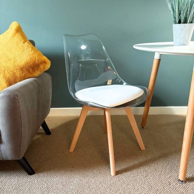 "Fusion Living Soho Clear and White Plastic Dining Chair with Squared Light Wood Legs - interlock "