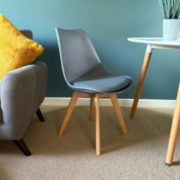 "Fusion Living Soho Dark Grey Plastic Dining Chair with Squared Light Wood Legs - interlock "