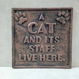 Cast Iron Cat Sign - A CAT AND IT'S STAFF LIVE HERE