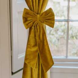 Graham and Green Set of Two Mustard Velvet Bow Curtain Tie Backs - thumbnail 1