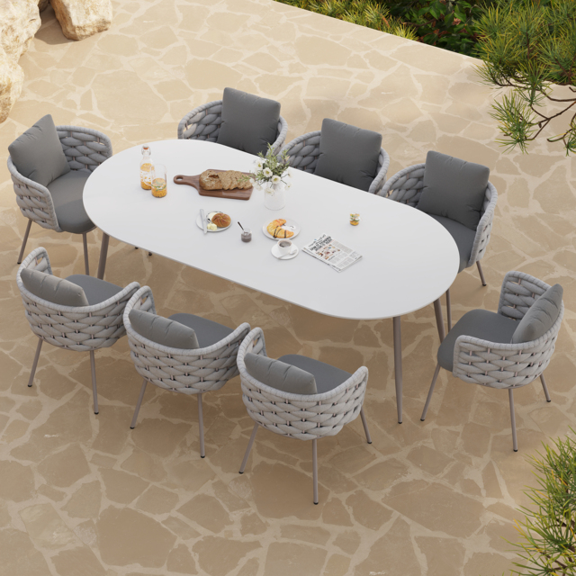 9 Pieces 2134 mm Outdoor Sintered Stone Top Dining Table Set with Rope Woven Armchairs - image 1