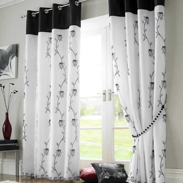 Alan Symonds Tahiti Floral Lined Ring Top Eyelet Voile Curtains Black and White 142 x 137cm - image 1