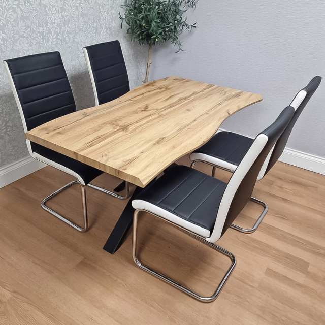Portland Black and Chrome Faux Leather Padded 4 Seater Dining Set - image 1