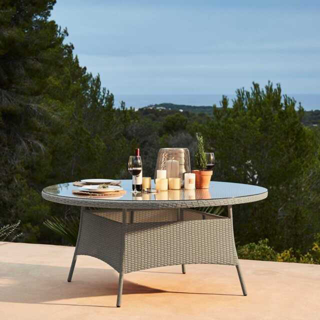 Kemble 8 Seater Round Rattan Garden Dining Table - Light Grey with Clear Glass Top - image 1