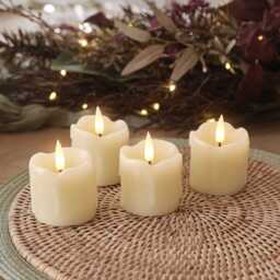 4 TruGlow® Dripping Wax LED Votive Candles