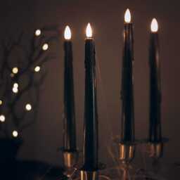 4 TruGlow® Black Dripping Wax LED Taper Candles With Remote Control - thumbnail 1