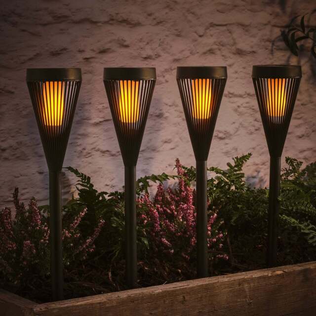 4 Flickering Flame Solar Torches - image 1