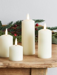Lights4fun Set of 4 TruGlow® Pillar LED Candles Ivory