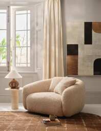 BARKER AND STONEHOUSE Cocoon Faux Sheepskin Swivel Snuggle Chair Neutral