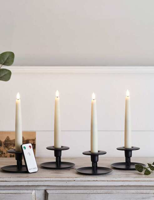 Lights4fun Set of 4 TruGlow® Short LED Taper Candles Ivory