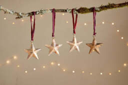 nkuku Roshani Star Baubles Set Of 4 - Christmas Decorations - Antique Brass