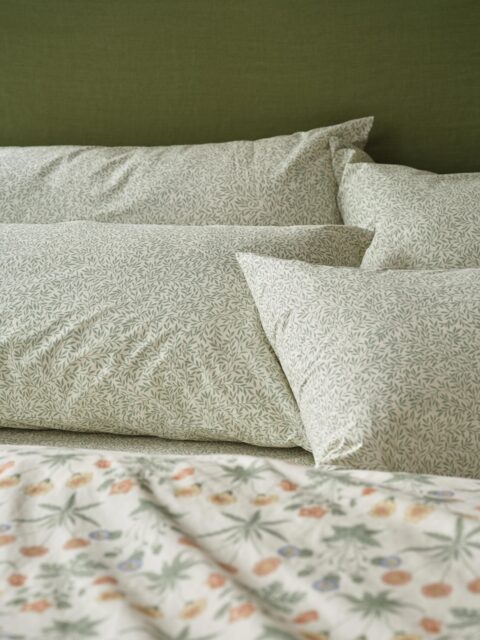 Mellow Green Standen Cotton Pillowcases (Pair) - Standard - Piglet in Bed