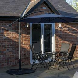 Rackhams Outdoor 4 Person Round Glass Top Garden Dining Table Chairs With Blue Banana Parasol and Base Set