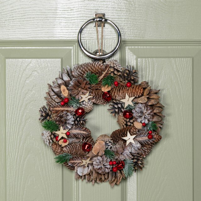 Rackhams 30cm Hanging Christmas Wreath with Red Jingle Bells, Berries and Frosted Stars - image 1