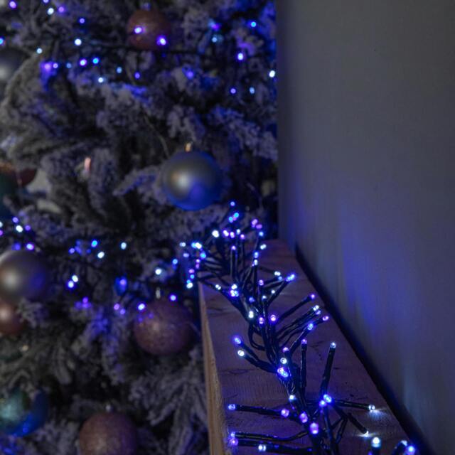 Rackhams 12.4m 960 LED Christmas Cluster Multi-Action String Lights with Timer in Blue, Purple & White - image 1