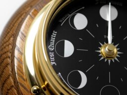 Rackhams Prestige Brass Moon Phase Clock With a Jet Black Dial Mounted on Solid English Dark Oak - thumbnail 3