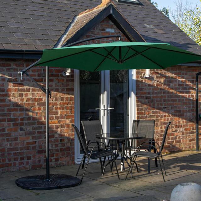 Rackhams Outdoor 4 Person Round Glass Top Garden Dining Table Chairs With Green Banana Parasol and Base - image 1