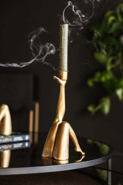 Kicking Leg Candle Holder In Gold - image 1