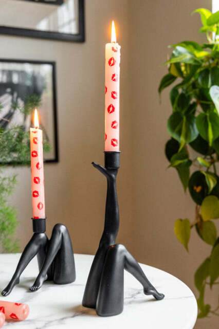Kicking Leg Candle Holder In Black - image 1