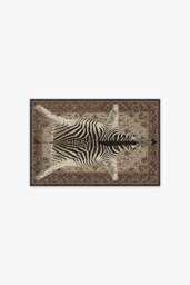 On Safari Hazel Flatwoven Rug by Iris Apfel Brown - 60x90 - Machine Washable Area Rug - Kid & Pet Friendly - Indoor Rugs - Ruggable - thumbnail 1