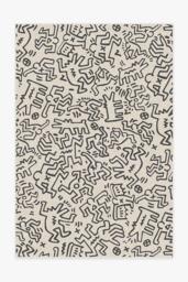 Block Party Black & Ivory Rug by Keith Haring - 185x275 - Machine Washable Area Rug - Kid & Pet Friendly - Indoor Rugs - Ruggable - thumbnail 1