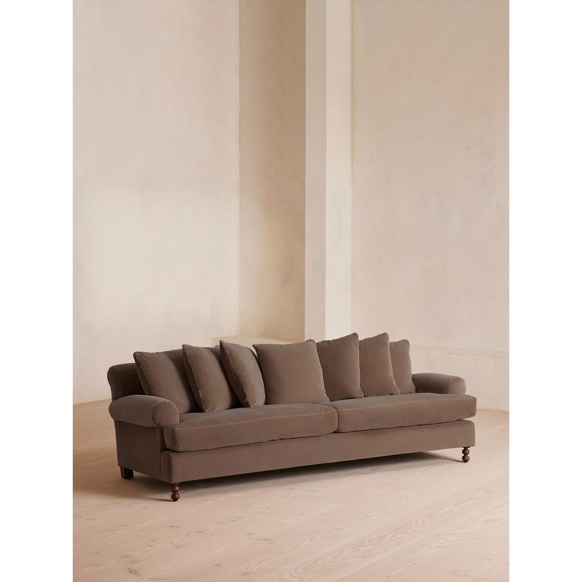 Audrey Velvet Scroll Arm Four-Seater Sofa | crafted in UK