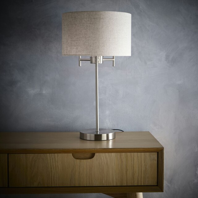 Tall Table Lamp in a Satin Nickel Finish with a Linen Lampshade to compliment the full design Silver