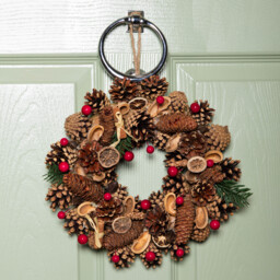 30cm Winter Spice Hanging Christmas Wreath with Pine Cones Red Berries & Dried Fruit