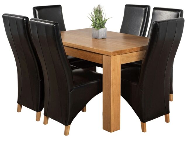 Dakota 152 x 87cm Medium Oak Dining Table and 6 Lola Leather Chairs Black Black