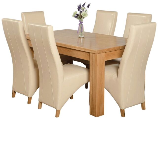 Dakota 152 x 87cm Medium Oak Dining Table and 6 Lola Leather Chairs Cream Cream